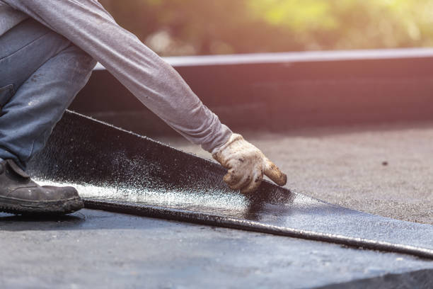 Professional Basement Waterproofing technician working in Midway, GA